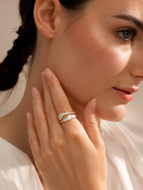 Anthropologie Jewelry - Flexible Gold and White Enamel Wave Ring
